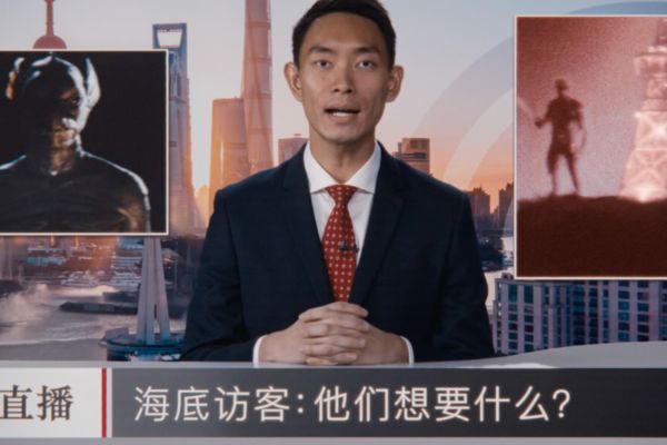 Chinese Newsreader played by Edward Wu in The War Between the Land and the Sea